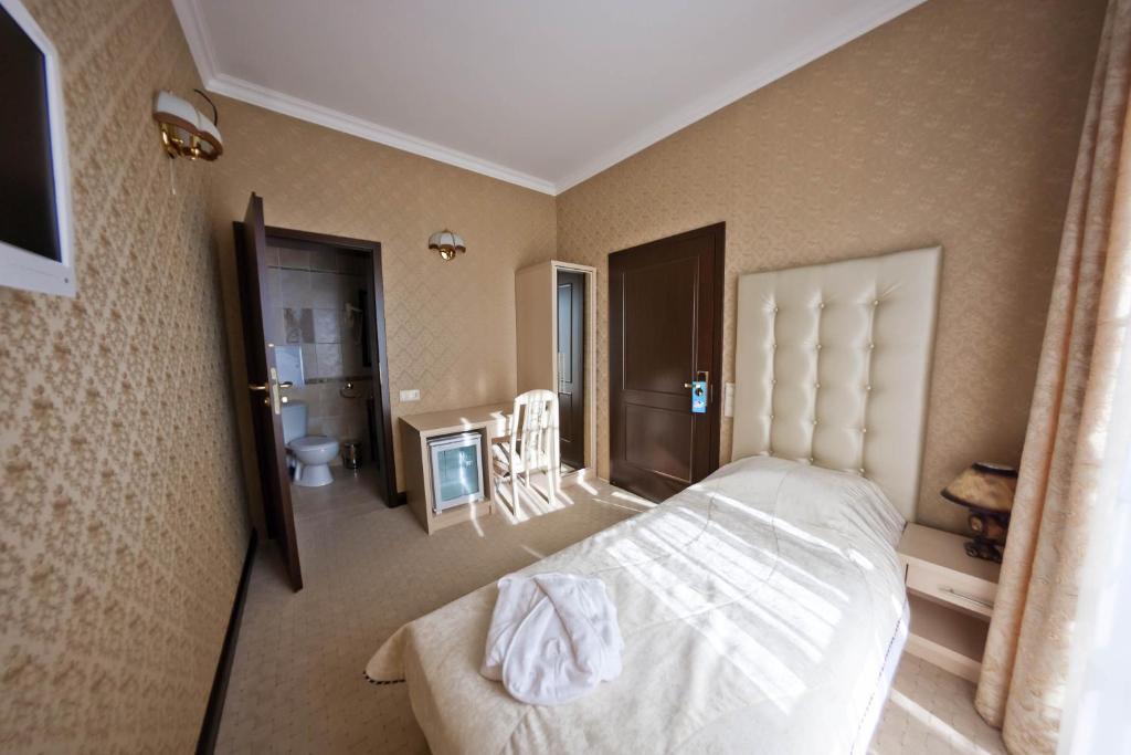 Villa Rosa Gomel Rum bild